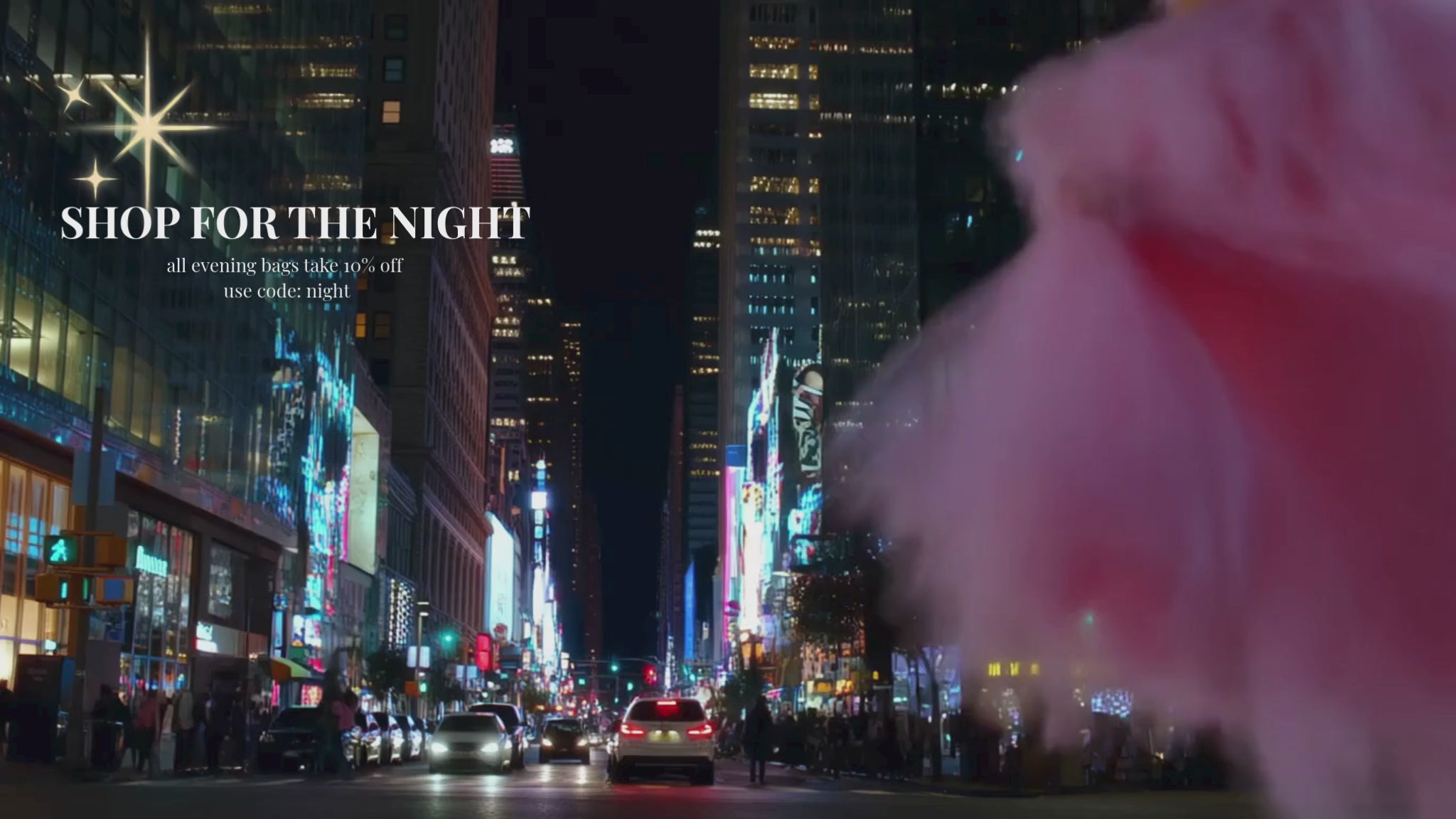 Load video: girl in pink dress shopping at night